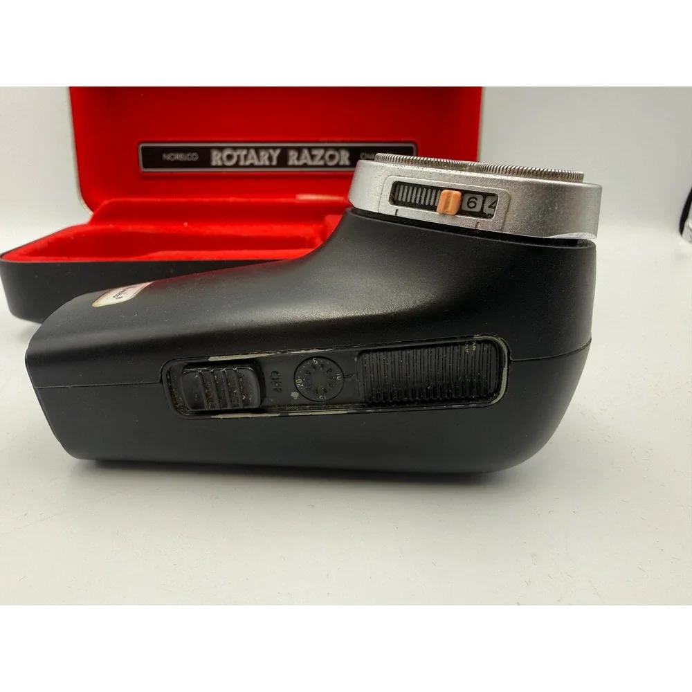 Vintage Norelco Rotary Razor Tripleheader Shaver with Red Lined Case and Charger